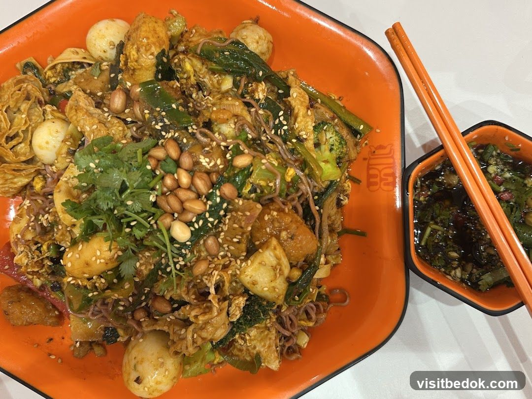 Spicy Noodle Dish with Dipping Sauce