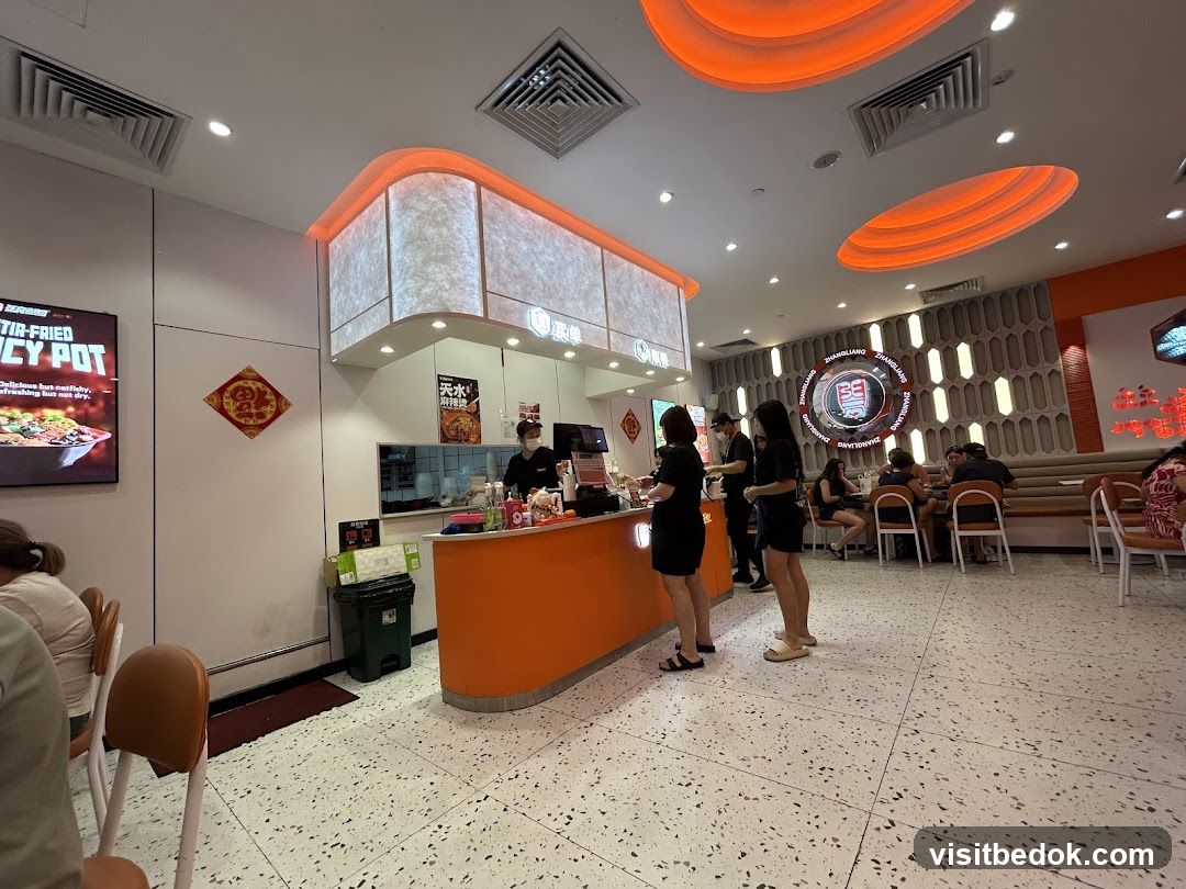 Restaurant Interior with Staff and Customers