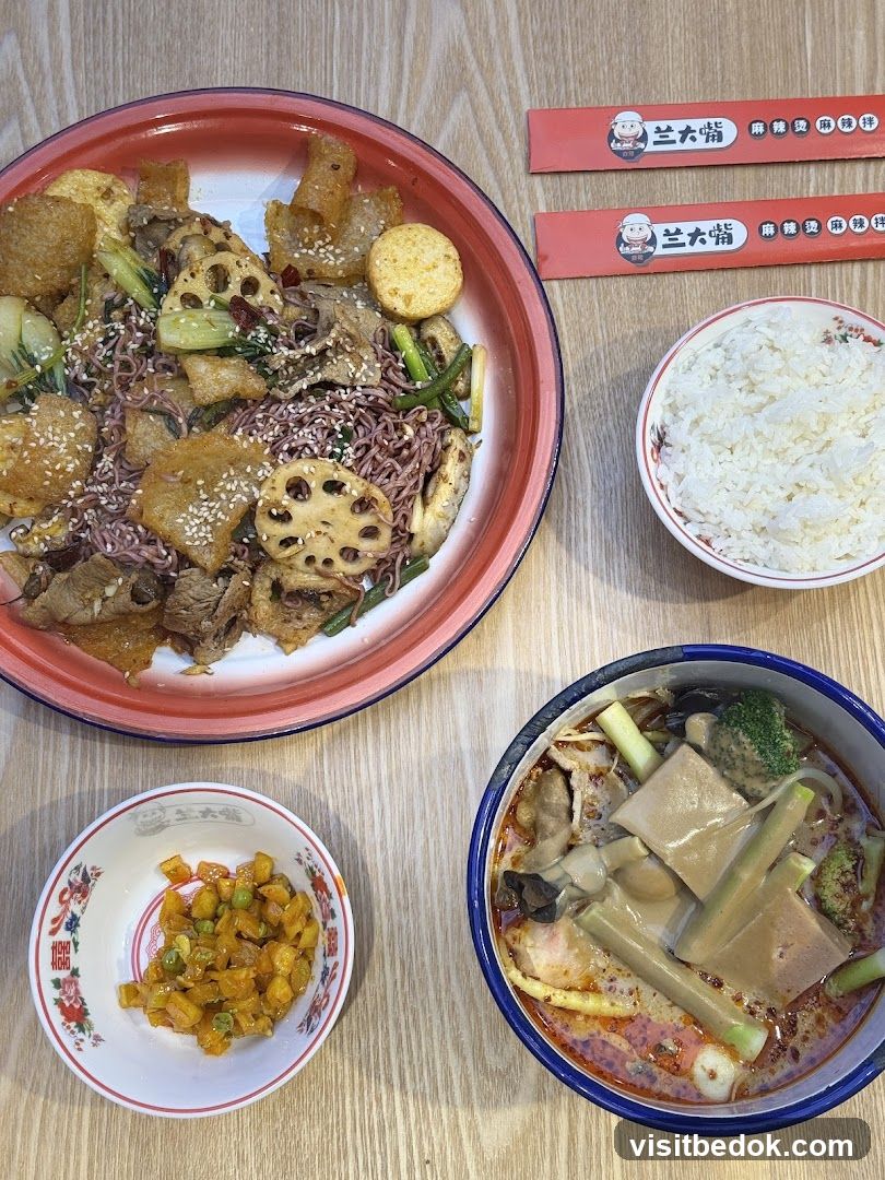 Spicy Noodle Dish with Rice and Side Dishes