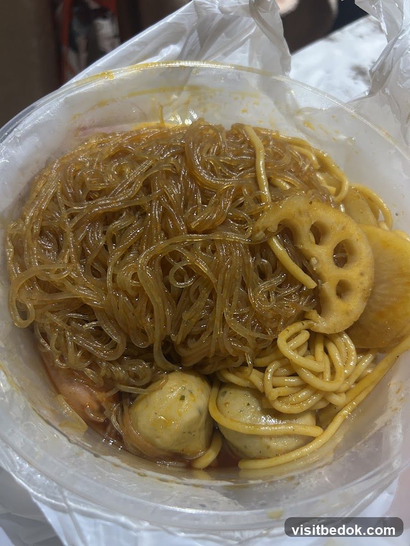 Noodles with Meatballs and Lotus Root