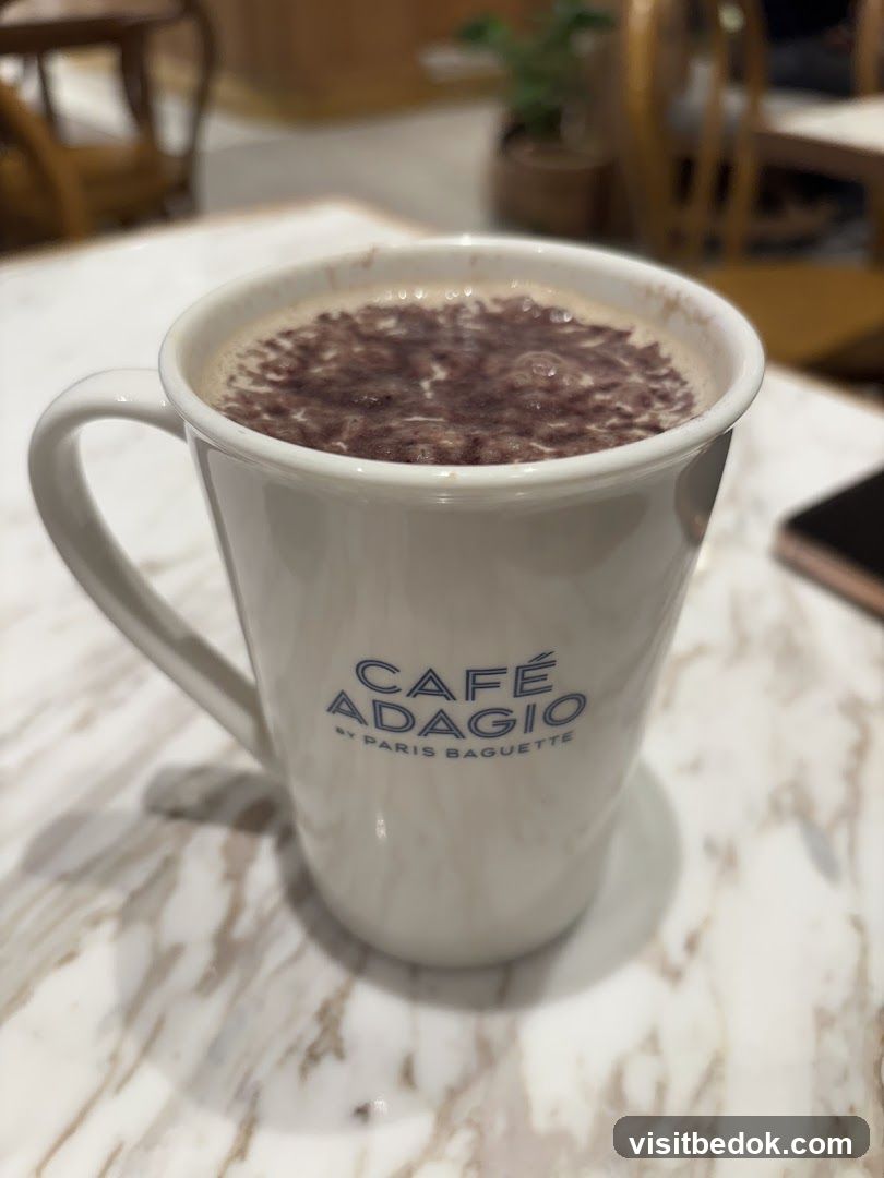 Hot Beverage in a Branded Mug