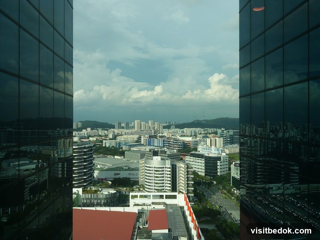 Cityscape with Modern Buildings and Cloudy Sky