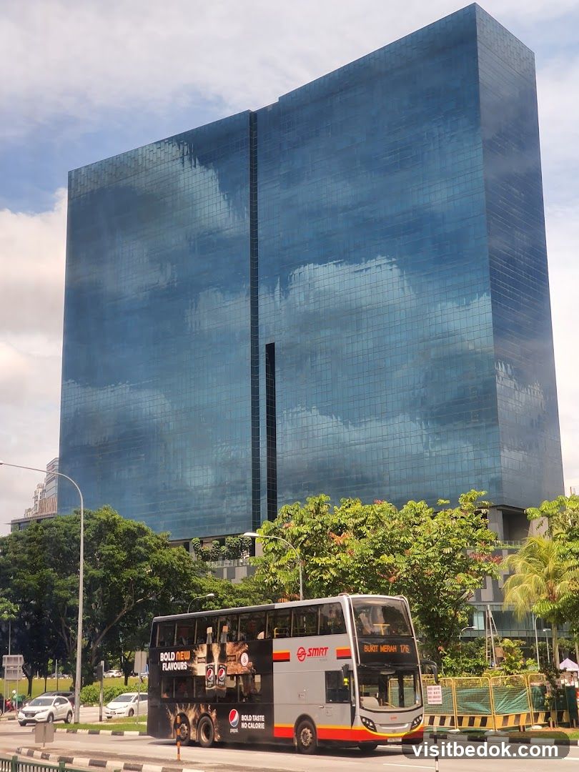 Modern Glass Building and Bus