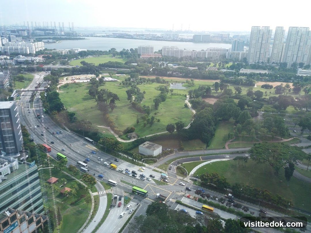 Aerial View of Urban Landscape with Park and Highway