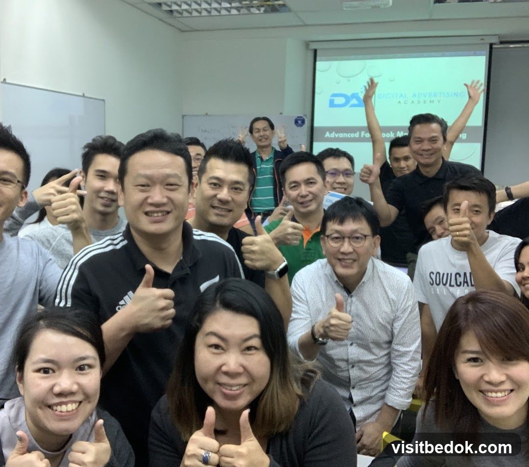 Group of people giving thumbs up