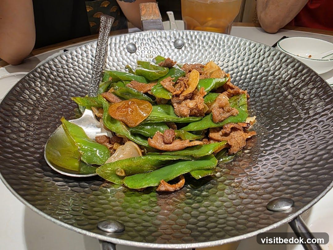 Stir-fried dish with green peppers and meat
