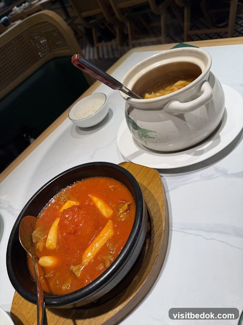 Two dishes of food on a table