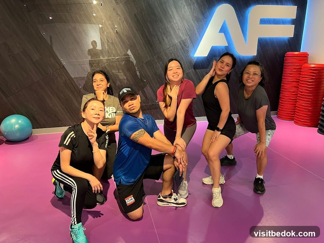 Group posing in a gym