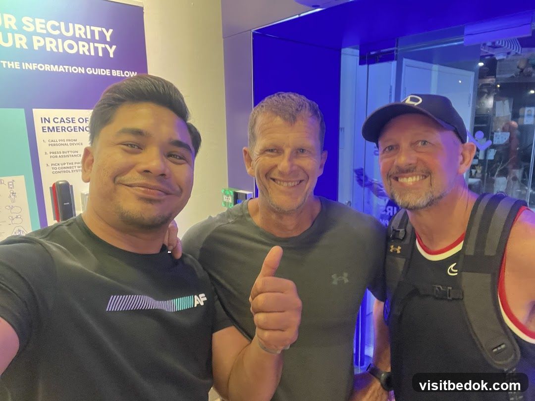 Three men smiling for a photo