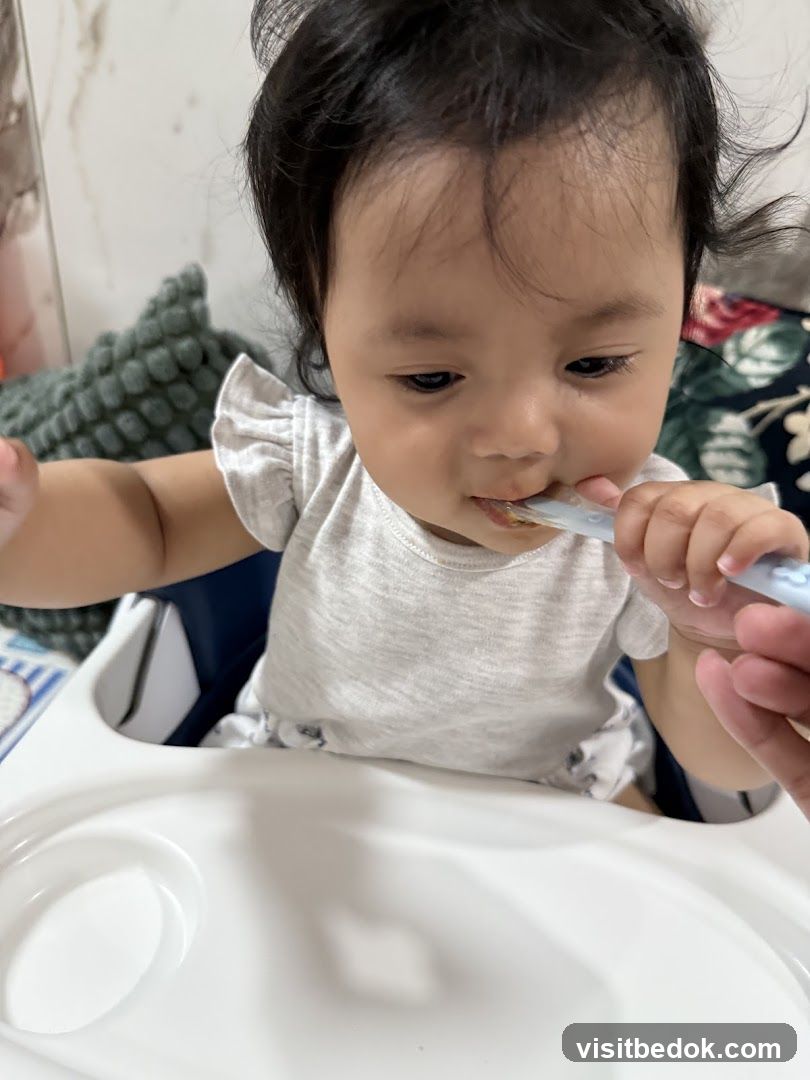 Baby being fed