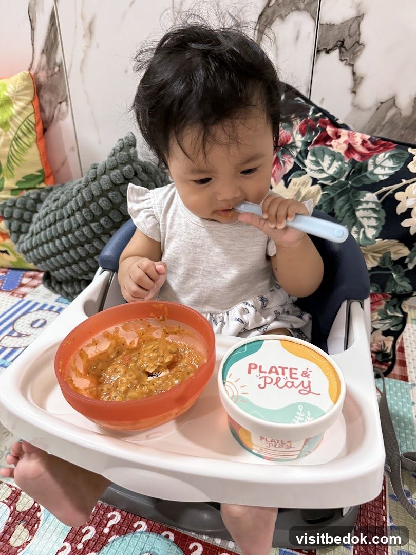 Baby eating from a bowl