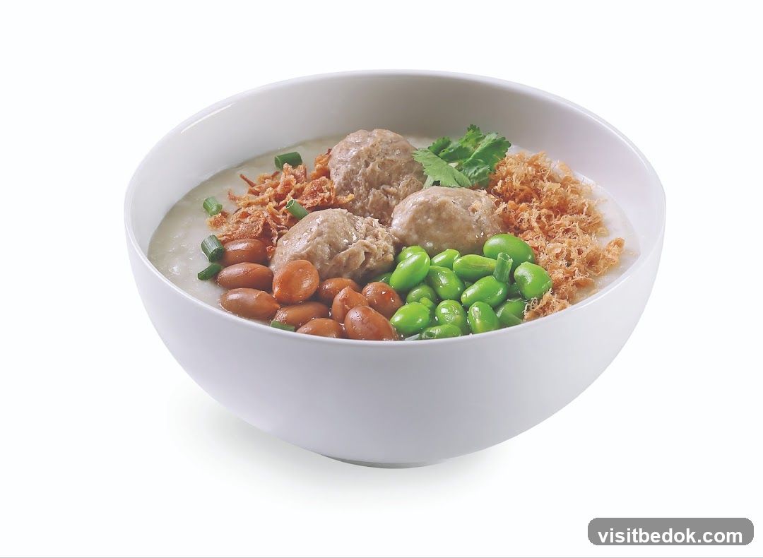 Bowl of Congee with Meatballs and Edamame