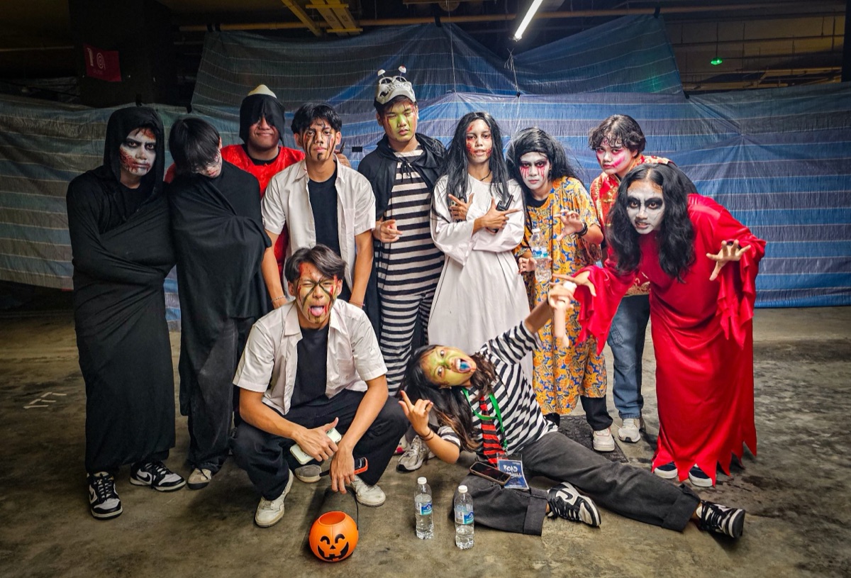 SpoOktober scare actors in costume at a HomeTeamNS clubhouse